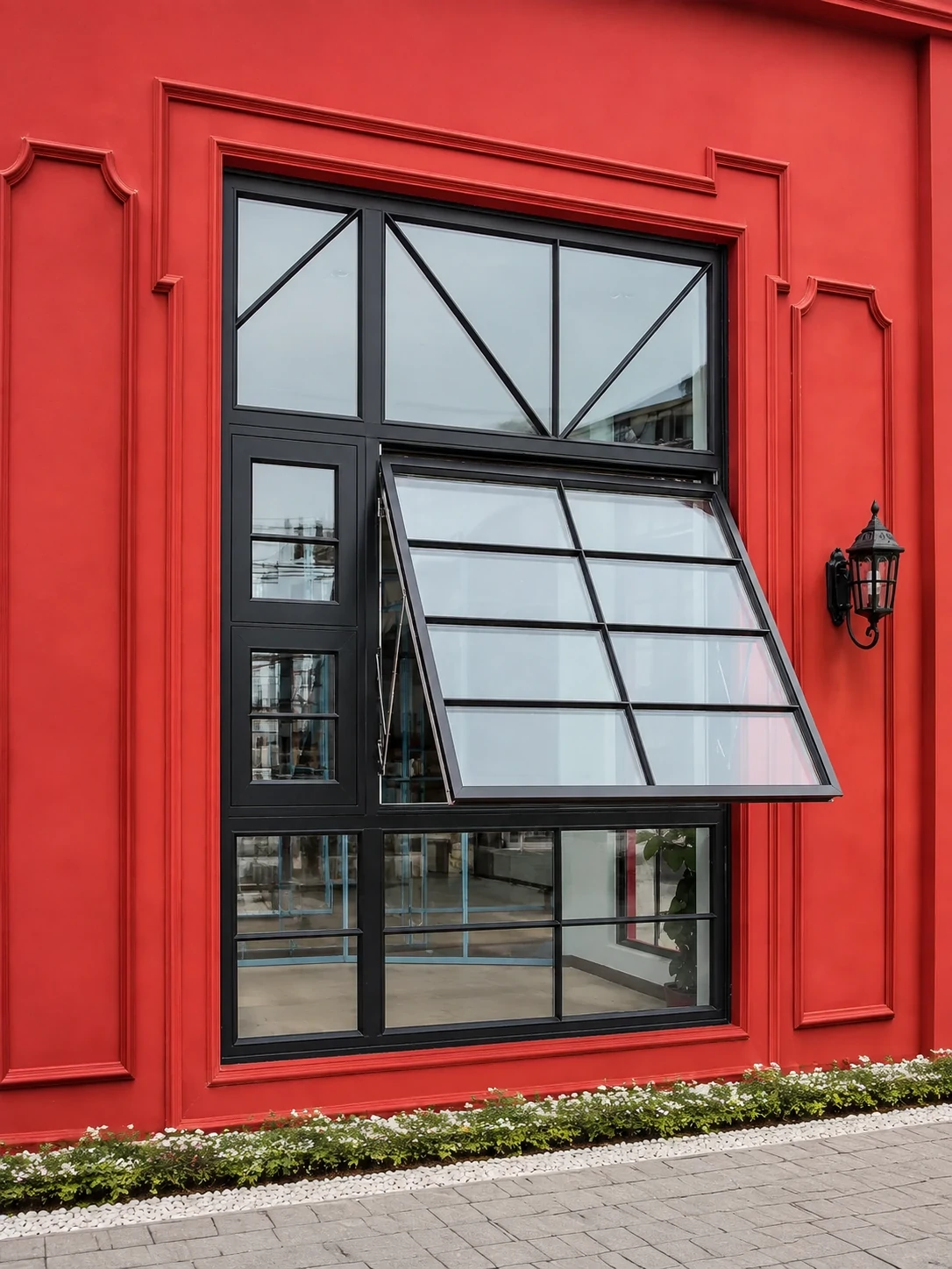 Black aluminum awning windows on a red brick wall